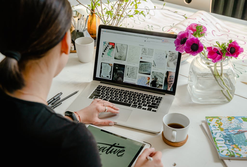 Owner Using Laptop For Digital Marketing
